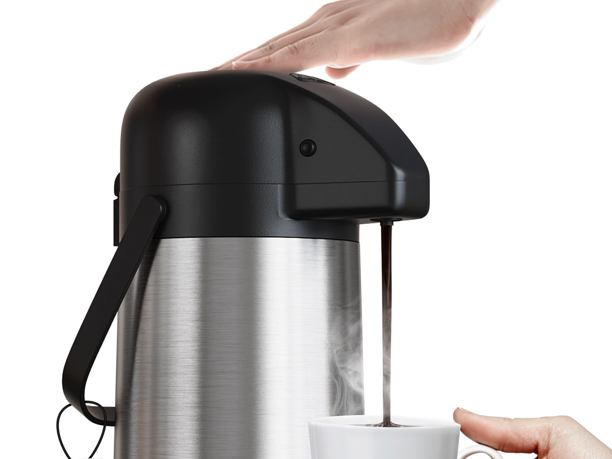 Gezoss Airpot pump-action dispenser filling a cup